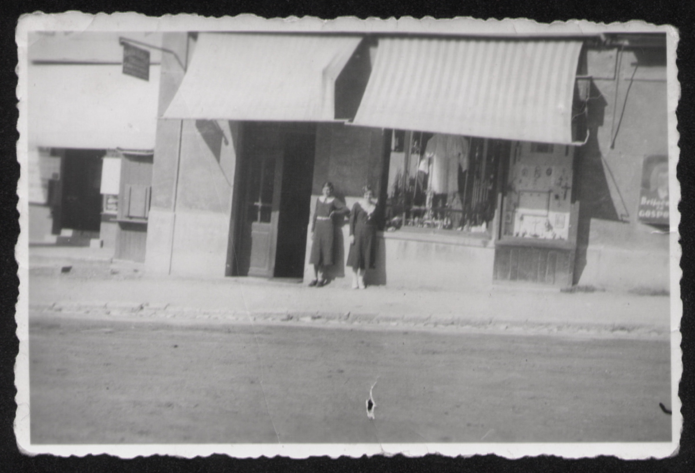 Ercigoj's shopfront in the 1920s, two women in the doorway